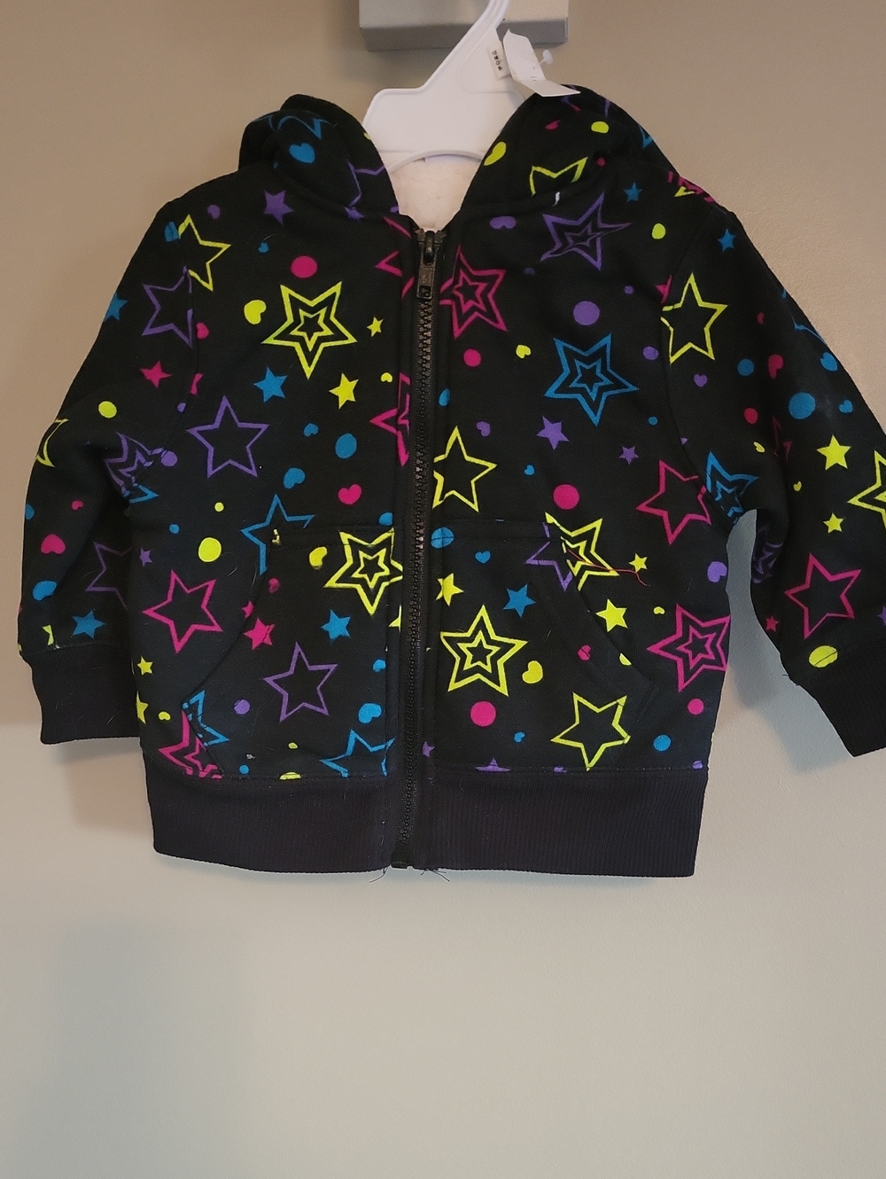 NWT black fleece lined zip up hoodie with colorful star print